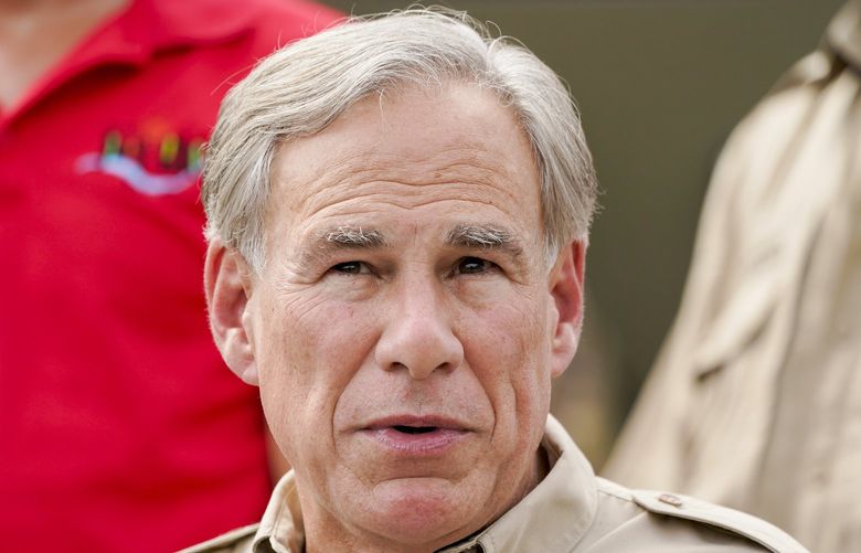 FILE – Texas Gov. Greg Abbott speaks during a news conference along the Rio Grande, Tuesday, Sept. 21, 2021, in Del Rio, Texas. Political observers are watching whether Abbott will posthumously pardon George Floyd for a 2004 arrest before the end of the year. (AP Photo/Julio Cortez, File) XCER107