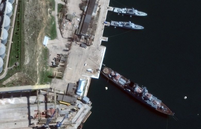 FILE — A satellite photo provided by Maxar Technologies shows the Russian Navy guided missile cruiser Moskva docked at a port in Sevastopol, Crimea, on April 7, 2022. Families of missing crew members say the Russian authorities are giving them the runaround after a flagship sank last week on Wednesday, April 13, in the Black Sea. (Satellite image ©2022 Maxar Technologies via The New York Times)  – NO SALES, EDITORIAL USE ONLY, MAXAR WATERMARK MUST NOT BE CROPPED OUT –   XNYT129 XNYT129