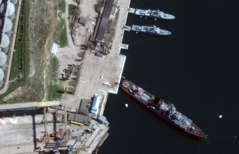 FILE — A satellite photo provided by Maxar Technologies shows the Russian Navy guided missile cruiser Moskva docked at a port in Sevastopol, Crimea, on April 7, 2022. Families of missing crew members say the Russian authorities are giving them the runaround after a flagship sank last week on Wednesday, April 13, in the Black Sea. (Satellite image ©2022 Maxar Technologies via The New York Times) – NO SALES, EDITORIAL USE ONLY, MAXAR WATERMARK MUST NOT BE CROPPED OUT – XNYT129 XNYT129