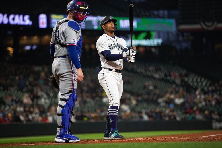 Julio Rodriguez struck out swinging in his first two at-bats Thursday against the Texas Rangers at T-Mobile Park. (Dean Rutz / The Seattle Times)