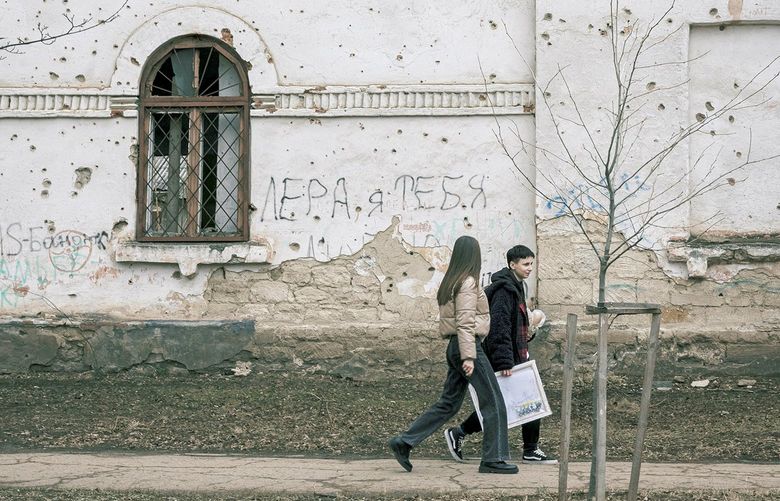 Reminders of the early 1990s conflict remain in the city, including this building marked by artillery fire, in Bender, Transnistria, on March 6. MUST CREDIT: Photo for The Washington Post by Gianmarco Maraviglia
