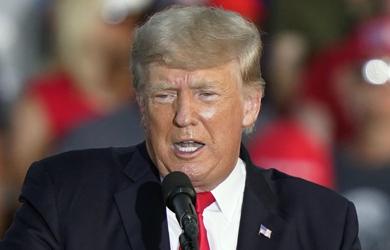 FILE – Former President Donald Trump speaks at a rally at the Lorain County Fairgrounds, June 26, 2021, in Wellington, Ohio. Former President Trump is returning to Ohio to try to boost Republican candidates and turnout ahead of the May 3 primary. Trump will headline an evening rally at the Delaware County Fairgrounds in Delaware, north of Columbus, on April 23. (AP Photo/Tony Dejak) NYPS203 NYPS203