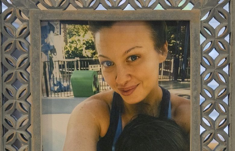 A portrait of Andrea Churna and her child Michael: Churna who was a Redmond mother of a 7-year-old at the time was shot and killed by law enforcement officers after calling dispatchers for help in Sept. 2020. 219048