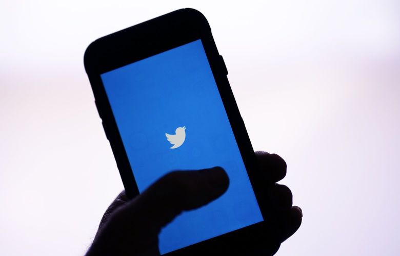 The Twitter application is seen on a digital device Monday, April 25, 2022, in San Diego. Elon Musk reached an agreement to buy Twitter for roughly $44 billion on Monday. (AP Photo/Gregory Bull) CAGB102 CAGB102