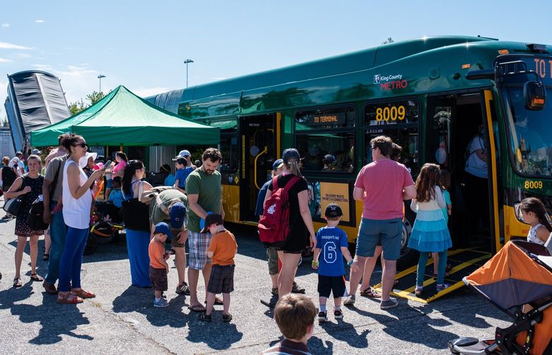 The Seattle community comes together at the Junior League of Seattle’s Touch-A-Truck event to explore King County Metro vehicles.