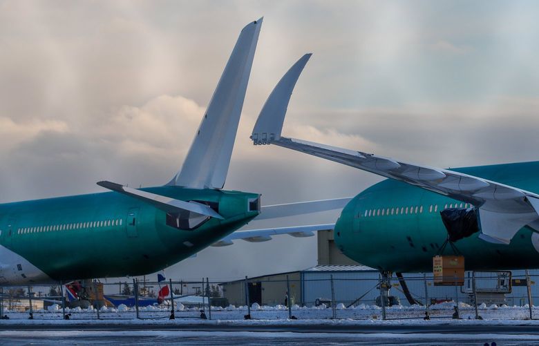 Paine Field Airport – Boeing airplanes – 010322

With weights filling in for engines that have yet to be mounted to the wings, unfinished 777X aircraft sit along a taxi way at Paine Field Monday, Jan. 3, 2022, in Everett, Wash. 219236