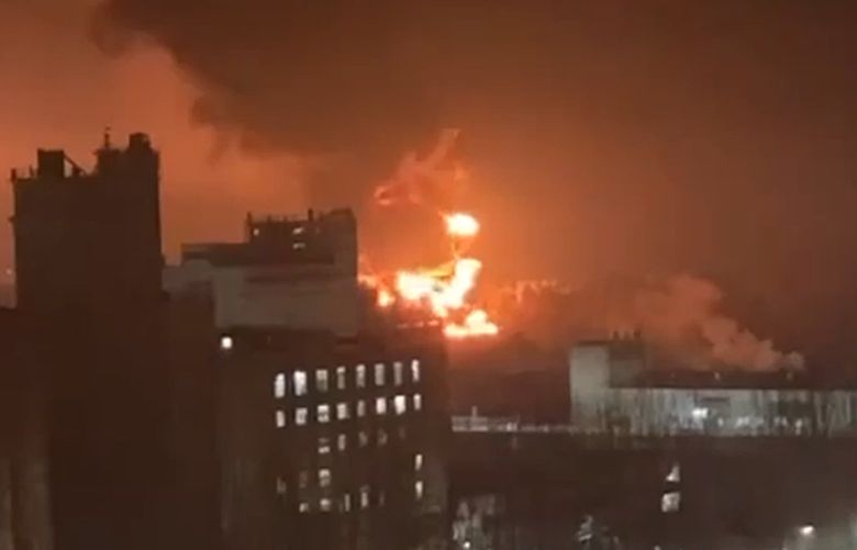 In this photo taken by an anonymous source, smoke and flame are seen from oil storage facilities hit by fire in Bryansk, Russia, Monday, April 25, 2022. The Emergencies Ministry said the massive fire at the depot in the city of Bryansk erupted overnight. The oil depot is owned by Transneft-Druzhba, a subsidiary of the Russian state-controlled company Transneft that operates the western-bound Druzhba (Friendship) pipeline carrying crude to Europe, and it wasn’t immediately clear if the blaze could affect the deliveries. (Anonymous source via AP) BIH105 BIH105