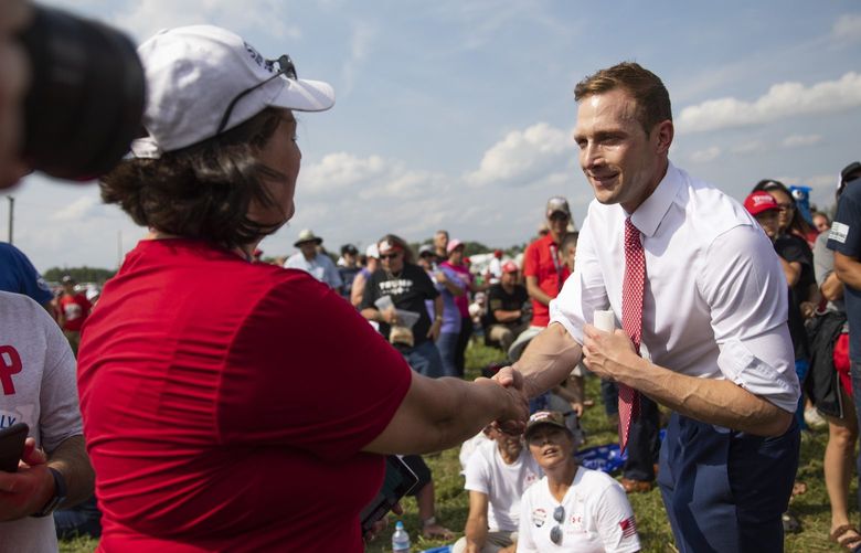 **EMBARGO: No electronic distribution, Web posting or street sales before 3 a.m. ET on Saturday, April 30, 2022. No exceptions for any reasons. EMBARGO set by source.** FILE – Max Miller, a former White House aide under President Donald Trump who is running for U.S. House, at a primary campaign rally in Wellington, Ohio, June 26, 2021. The slugfest in Ohio’s 2022 Republican primaries has buried the brand of good-natured, country-club conservatism that was once a hallmark of the state. (Maddie McGarvey/The New York Times) XNYT223 XNYT223