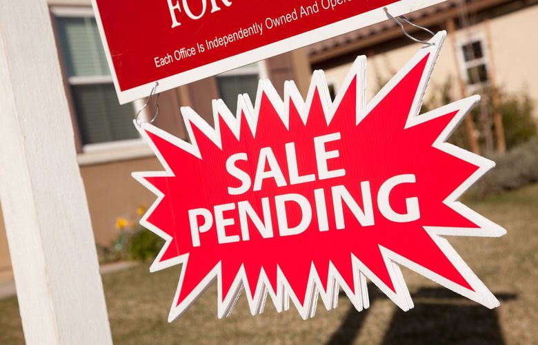 Home sale pending sign  house for sale. (Dreamstime/TNS) 