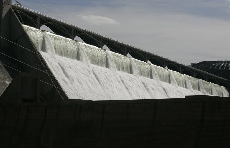 Folk singer Woody Guthrie wrote “Roll On, Columbia, Roll On” about the Columbia River (this is the Grand Coulee Dam on the river in Eastern Washington), and it was approved as the official Washington state folk song in 1987. (Alan Berner / The Seattle Times, 2008)