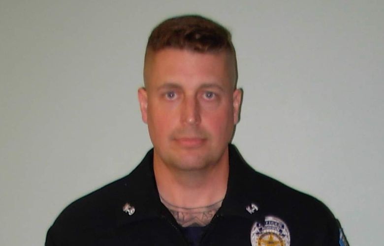 Auburn police officer Jeffrey Nelson.


This is Nelson being processed the night of the shooting, according to Elizabeth Miller of the Auburn Examiner.