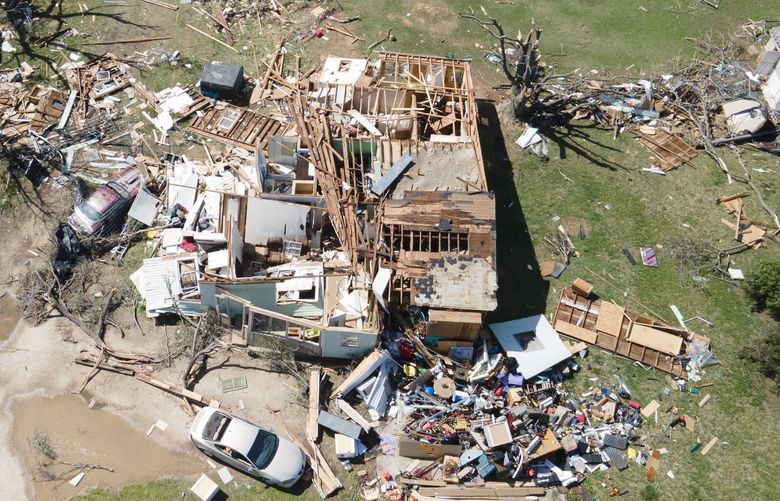 A home is destroyed from a possible tornado the next before near Andover, Kan., on Saturday, April 30, 2022  A suspected tornado that barreled through parts of Kansas has damaged multiple buildings, injured several people and left more than 6,500 people without power. (Jaime Green/The Wichita Eagle via AP) KSWIE105 KSWIE105