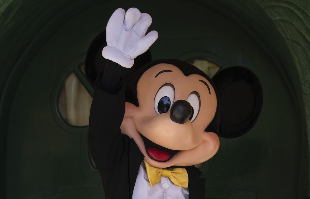 Mickey Mouse can start hugging again at Disney parks