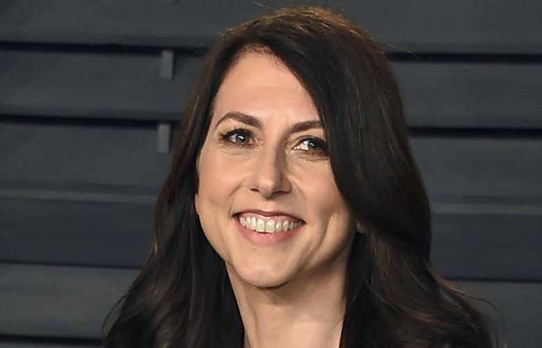 FILE – In this March 4, 2018, file photo, MacKenzie Scott arrives at the Vanity Fair Oscar Party in Beverly Hills, Calif. The billionaire philanthropist revealed that she has donated nearly $4 billion to 465 nonprofits in a new blog post Wednesday, March 23, 2022 confirming the gifts that the groups have been announcing on their own for months. (Photo by Evan Agostini/Invision/AP, File) NYPS204 NYPS204