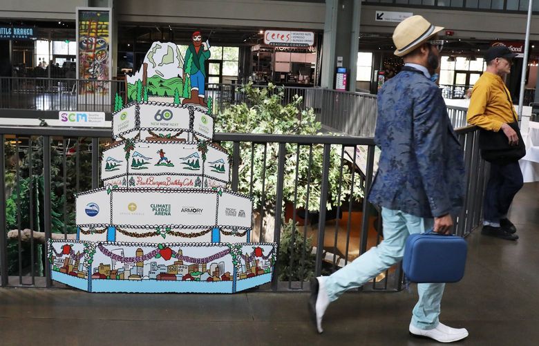 A cutout representation of the world’s largest birthday cake from the 1962 World’s Fair is far shorter than the 23-foot-high cake there 60-years-ago.


LO Kickoff to 60th anniversary celebration of Seattle Center, Armory at the center.

Thursday April 21, 2022 220194