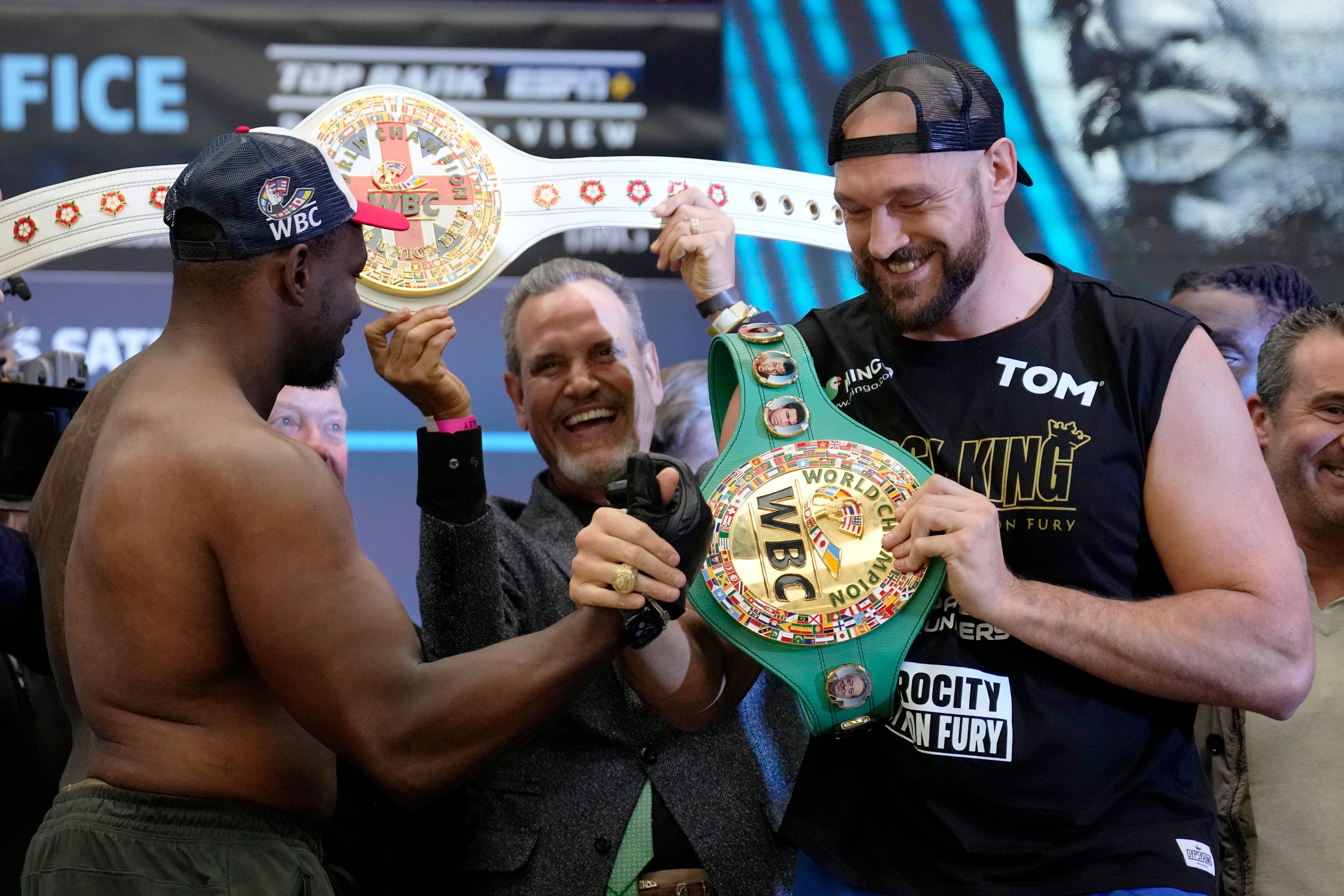 Fury keeps it light at weigh-in for title fight vs. Whyte | The