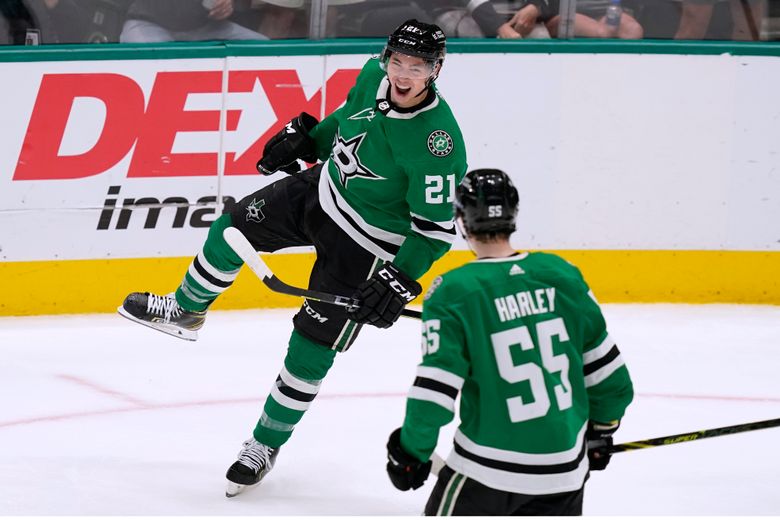 Dallas Stars Mike Modano celebrates his game-winning goal with