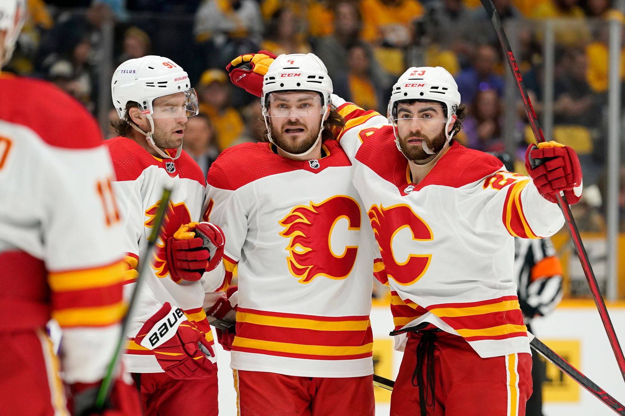 Elias Lindholm and Daniel Vladar of the Calgary Flames celebrates