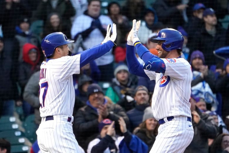 Chicago Cubs starter Alec Mills winds up during the first inning