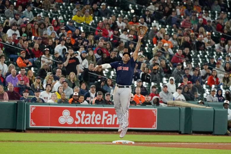 Boston Red Sox relief pitcher Hirokazu Sawamura throws during the