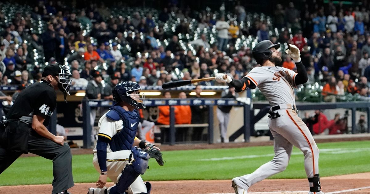 SF Giants' OF Luis González leaves game after hit-by-pitch