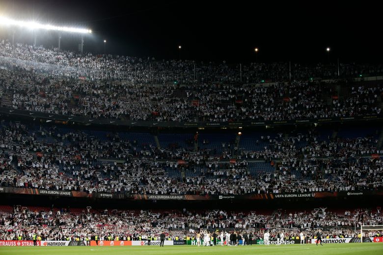 Barca fans upset after influx of Eintracht fans at Camp Nou | The Seattle  Times