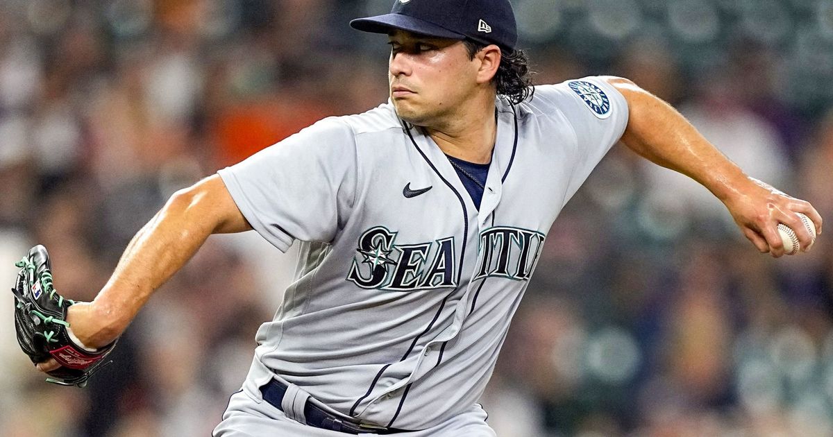 Seattle Mariners pitcher Marco Gonzales poses for a photo as he wears a  club T-shirt with Believe across the front before a baseball game against  the Los Angeles Angels, Sunday, Oct. 3