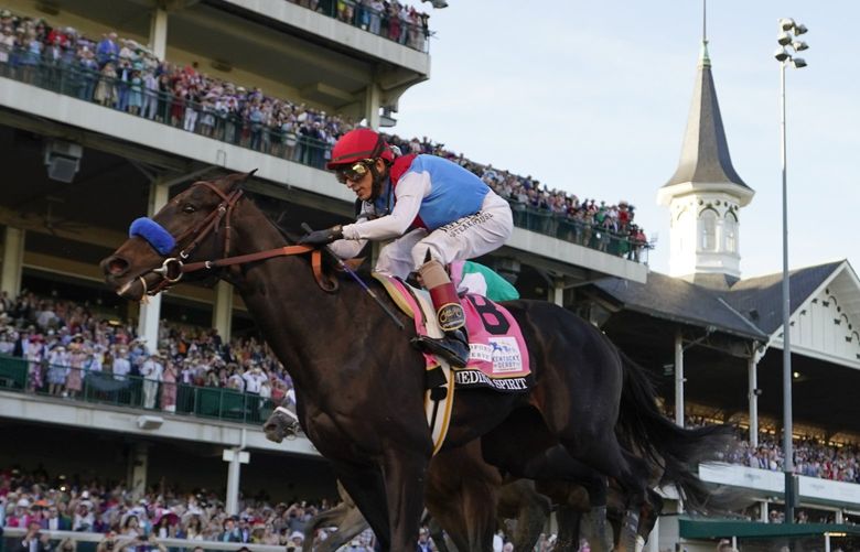 FILE – John Velazquez rides Medina Spirit across the finish line to win the 147th running of the Kentucky Derby at Churchill Downs in Louisville, Ky., May 1, 2021. The Kentucky Derby television broadcast will be produced by a woman for the first time in the 148-year-old history of the race. Lindsay Schanzer on Thursday, April 21, 2022, will be named senior producer of NBC Sportsâ€™ Derby coverage and oversee the networkâ€™s horse racing production. Itâ€™s her 10th Derby but her first running the show as she makes some history. (AP Photo/Jeff Roberson, File) NY152 NY152