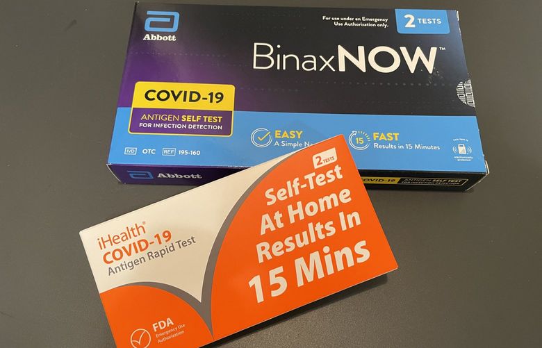 Size difference between iHealth (sent by King County) and Abbott Laboratories’ BinaxNOW (purchased at Bartell Drugs) brands of Covid-19 Antigen Rapid Tests.
