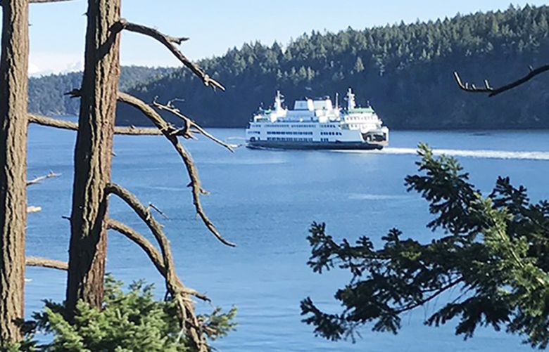 A Washington State Ferry cross Harney Channel between Shaw and Orcas Island. The Washington Board of Natural Resources is currently considering a proposal to change the name of the channel to honor an Indigenous county commissioner.