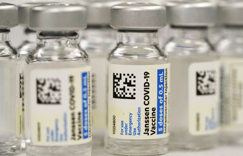 FILE – Vials of the Johnson & Johnson COVID-19 vaccine are seen at a pharmacy in Denver on Saturday, March 6, 2021. On Thursday, May 5, 2022, U.S. regulators strictly limited who can receive this vaccine due to a rare but serious risk of blood clots. (AP Photo/David Zalubowski, File) NY598 NY598