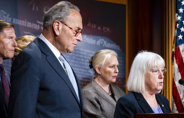Sen. Patty Murray (D-Wash.) speaks as Senate Majority Leader Chuck Schumer (D-N.Y.) looks on during a news conference on a planned Senate vote on legislation that would enshrine abortion rights into federal law, in Washington, Thursday, May 5, 2022. The legislation is all but certain to be blocked by Republicans, falling short of the 60 votes that would be needed to advance past a filibuster. (Pete Marovich/The New York Times) XNYT121