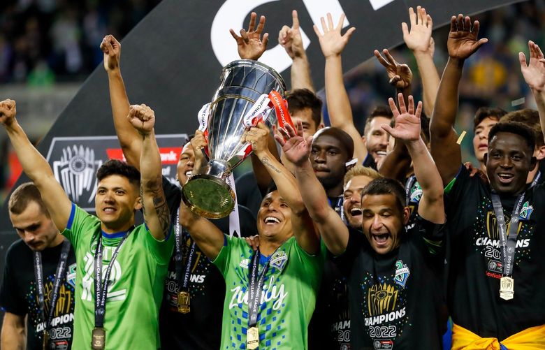 Lumen Field – Seattle Sounders FC vs. Pumas UNAM – CONCACAF CCL Final – 050422

Seattle Sounders FC forward Raul Ruidíaz celebrates with the trophy after a 3-0 win over the Pumas to win the CONCACAF CCL Final Wednesday, May 4, 2022, in Seattle, Wash. 220292