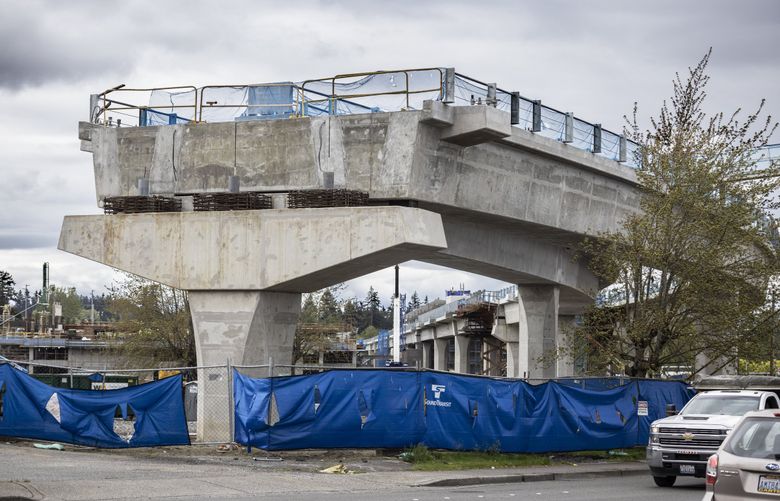 Sound Transit’s light-rail extension will carry passengers from Lynnwood to downtown Seattle in 28 minutes. Service is scheduled to start in 2024. (Steve Ringman / The Seattle Times)