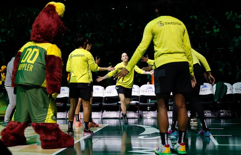 Climate Pledge Arena – Seattle Storm vs. Minnesota Lynx – 050622

Seattle Storm guard Sue Bird gets high-fives from teammates as she is introduced to the crowd before the start of a game Friday, May 6, 2022, in Seattle, Wash. 220302