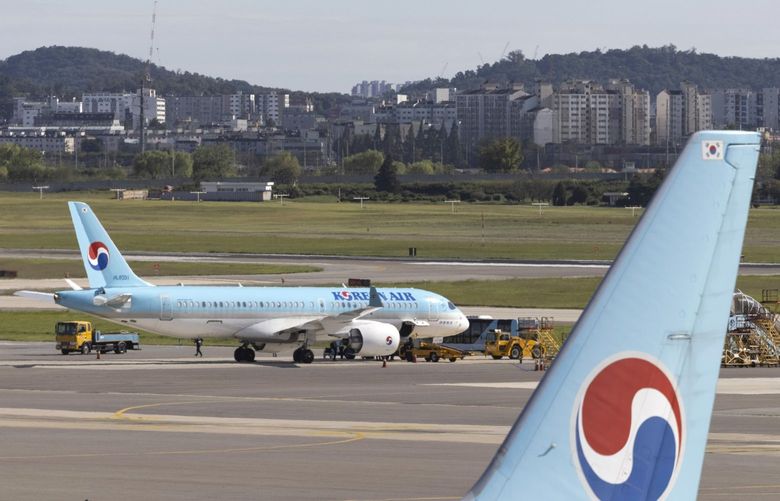 Korean Air Lines Co. passenger aircraft on the tarmac at Gimpo International Airport in Seoul, South Korea, on Friday, Sept. 17, 2021. South Korean financial markets will close from Sept. 20 to Sept. 22 for the Chuseok holidays. Photographer: SeongJoon Cho/Bloomberg