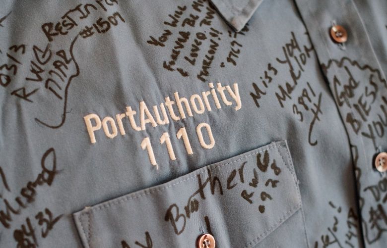 Marlon Lucas’s fellow operators signed his work shirt after his death. MUST CREDIT: Photo for The Washington Post by Kristian Thacker.