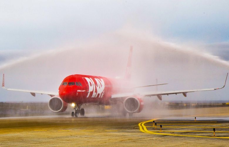 An Airbus SEÂ A321neo passenger aircraft, operated by Play Air, taxis through a ceremonial spray ahead of its inaugural flight to London Stansted airport, from Keflavik International Airport, near Reykjavik, Iceland, on Thursday, June 24, 2021. Iceland’s new airline startupÂ PlayÂ Air seeks to capitalize on the islandâ€™s recovery from the coronavirus crisis and inclusion on the U.K.’s green list for quarantine-free travel. Photographer: Sigga Ella/Bloomberg 775671216