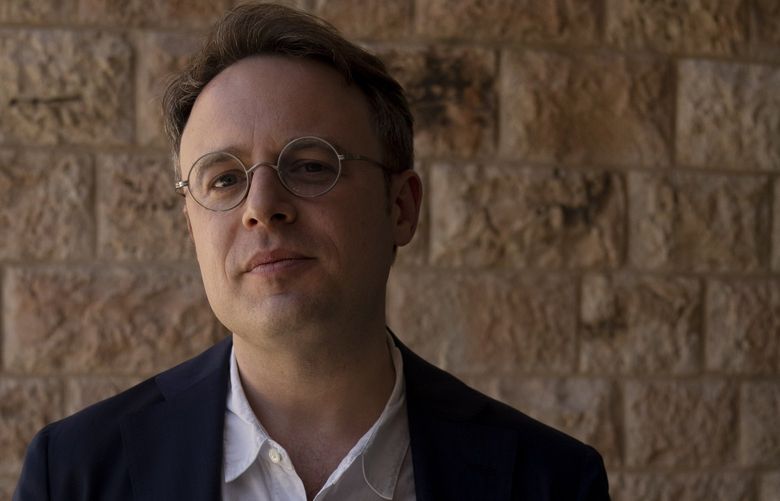 American novelist Joshua Cohen, who won the 2022 Pulitzer Prize for fiction with his novel, “The Netanyahus,” poses for a portrait in Jerusalem, Tuesday, May 10, 2022. Cohen says his book is also about Donald Trump, and how authoritarian leaders bombard their countries with their own reality TV shows. (AP Photo/Maya Alleruzzo) XMA102 XMA102