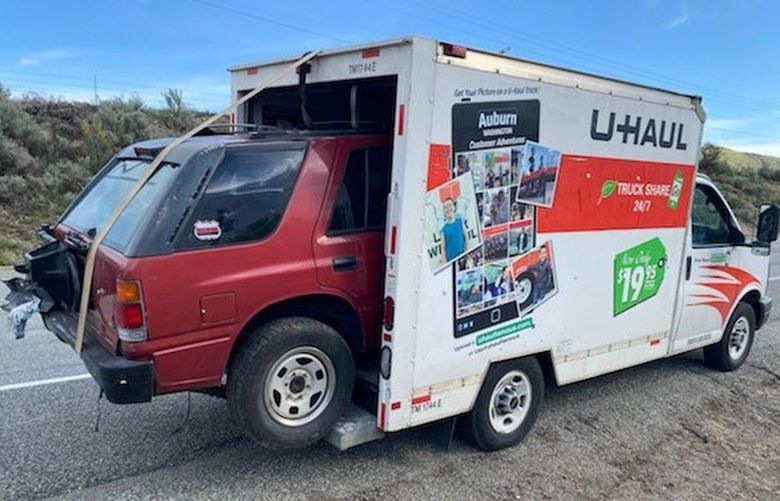 A U-Haul with a SUV was stopped on Highway 97, north of Okanogan.