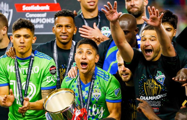 Lumen Field – Seattle Sounders FC vs. Pumas UNAM – CONCACAF CCL Final – 050422
Seattle Sounders FC forward Raul RuidÃŒaz celebrates with the trophy after a 3-0 win over the Pumas to win the CONCACAF CCL Final Wednesday, May 4, 2022, in Seattle, Wash. 220292 220292