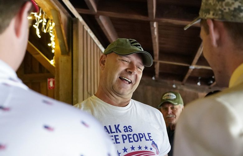 Pennsylvania state Sen. Doug Mastriano, R-Franklin,a Republican running for Governor of Pennsylvania, meets supporters at a campaign stop Tuesday, May 10, 2022, in Portersville, Pa. Republicans are openly worrying that Mastriano, a leading candidate in the crowded GOP field in the race, is unelectable in the fall general election and will fumble away an opportunity for the party to take over the battleground state’s executive suite. (AP Photo/Keith Srakocic) PAKS104 PAKS104