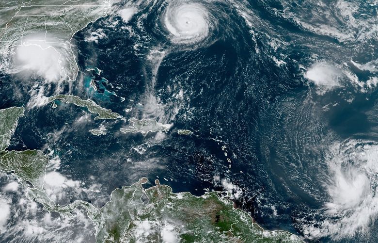 FILE – This satellite image provided by the NOAA shows five tropical storms churning in the Atlantic basin on Monday, Sept. 14, 2020. The storms, from left, are Hurricane Sally over the Gulf of Mexico, Hurricane Paulette over Bermuda, the remnants of Tropical Storm Rene, and Tropical Storms Teddy and Vicky. A NOAA study released on Wednesday, May 11, 2022 says cleaner air in Europe and the United States is helping trigger a dramatic increase in the number of Atlantic hurricanes. (NOAA via AP) NY679 NY679