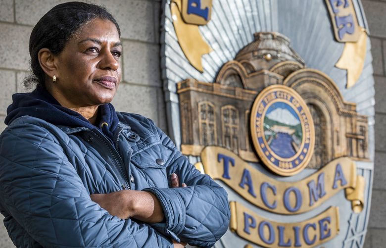 Valencia Brooks, a Black police officer who retired in February after 32 years at the Tacoma Police Department, stands outside of the Tacoma Police Department Headquarters Tuesday, November 16, 2021.

Brooks filed 18 complaints over the years taking aim at engrained racism in the department. Despite convincing evidence, only one was upheld, and that one only in part.  Brooks had a front-row seat to decades of institutional racism
 218811 218811