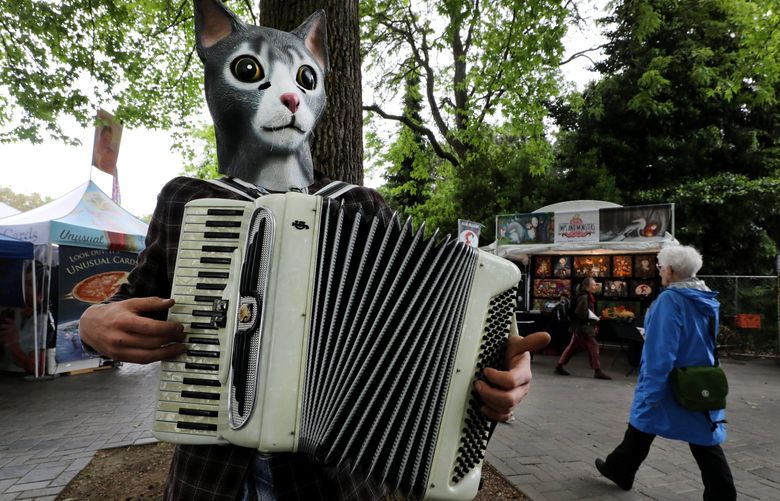 Accordion Cat, his performing name, busk near the fountain at the 48th Annual Northwest Folklife Festival on Friday.

Friday May 24, 2019


LO Linesonly
The 48th Annual Northwest Folklife Festival  210360