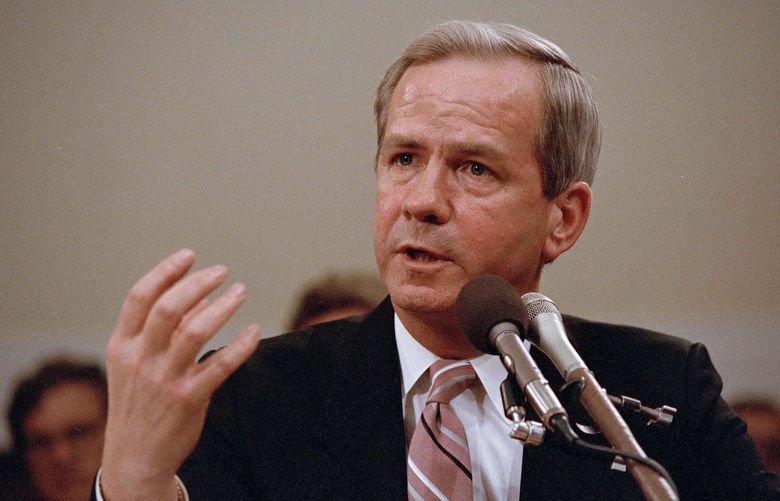 Former National Security Advisor Robert C. McFarlane gestures while testifying before the House-Senate panel investigating the Iran-Contra affair on Capitol Hill in Washington, May 13, 1987. At one point in his testimony, McFarlane suggested he was ready to kill himself if he was in danger of being kidnapped or tortured during a secret trip to Teheran in May 1986. (AP Photo/Lana Harris)
