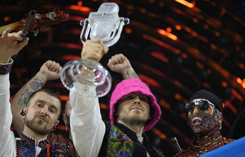 Members of the Kalush Orchestra from Ukraine celebrate after winning the Grand Final of the Eurovision Song Contest at Palaolimpico arena, in Turin, Italy, Saturday, May 14, 2022. (AP Photo/Luca Bruno) TH192 TH192