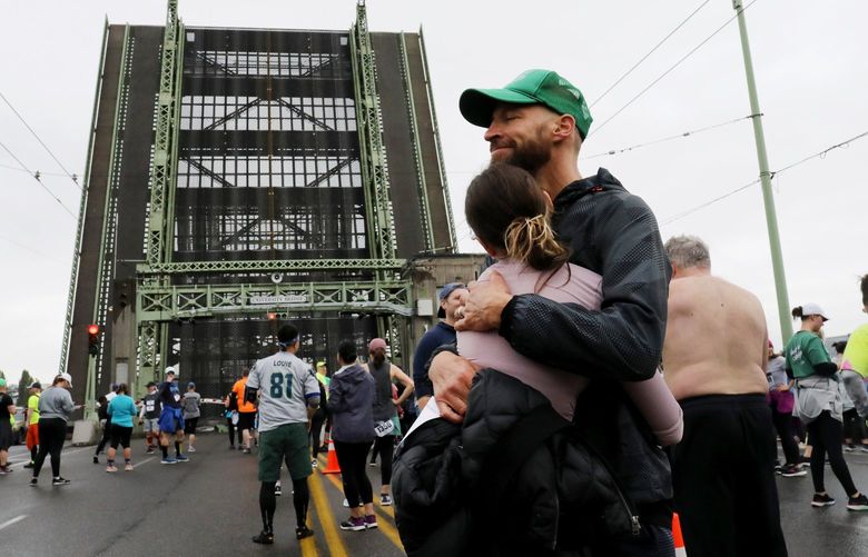 Scott Falkin and his daughter Mimi almost beat the University Bridge going up in the 8K race from Husky Stadium and back to it Saturday morning. Thousands participated in the fundraising event, the 40th in the series of Beat The Bridge to beat diabetes.
(Nordstrom main and presenting sponsor on the website)
Ref to more photos online
LO Linesonly Beat the Bridge 8K 220400