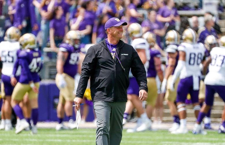 Husky Stadium – University of Washington football Spring Preview game – 043022

Washington Huskies head coach Kalen DeBoer smiles at the sidelines as he walks back up the field after a score during the UW football Spring Preview game Saturday, April 30, in Seattle, Wash. 220271