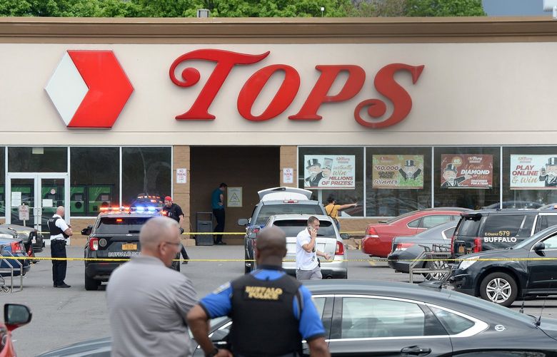 Police on scene at a Tops Friendly Market on Saturday, May 14, 2022, in Buffalo, New York. Ten people were killed after a mass shooting at the store, with the shooter in police custody. (John Normile/Getty Images/TNS) 47977170W 47977170W